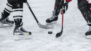 hockey players taking a faceoff