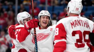 bertuzzi, mantha and larkin. celebrating a goal with detroit red wings